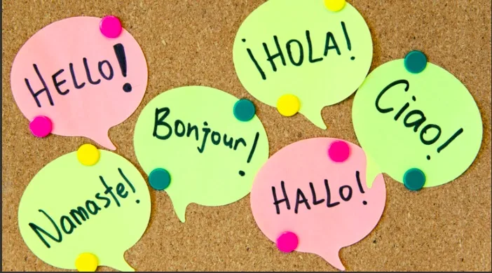 Bilingualism in children illustrated with colorful post-it notes saying hello in different languages, showing adaptability in language learning.