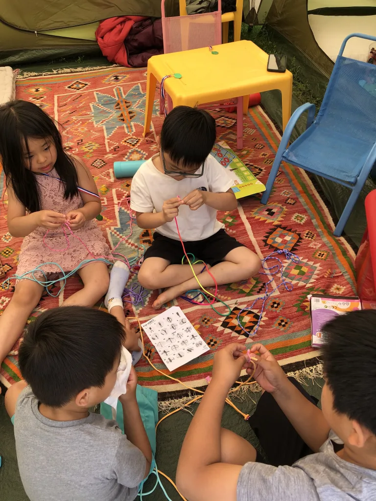 French activities in summer camp, speaking French together.